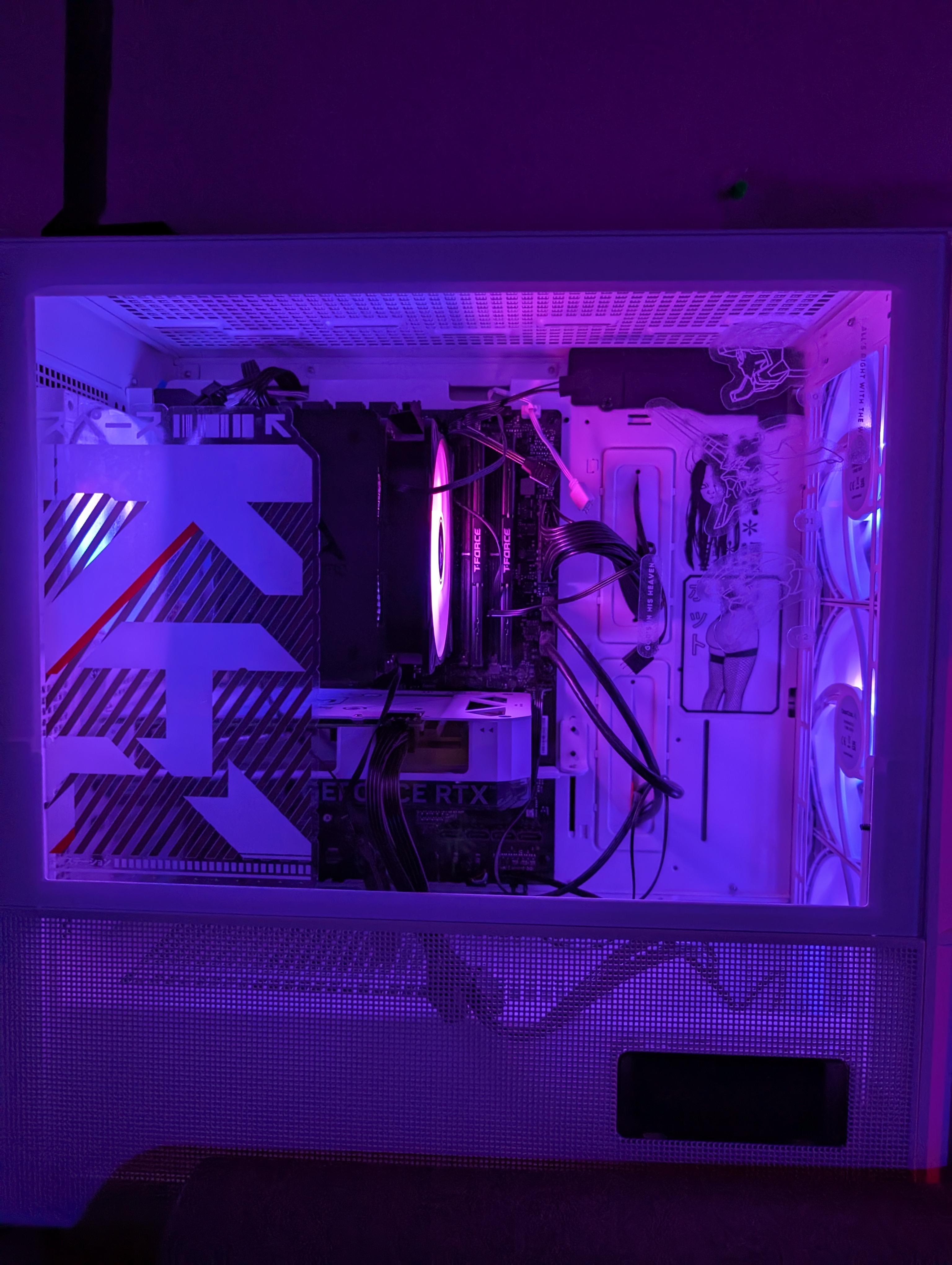 Front shot of PC with violet and magenta RGB lighting