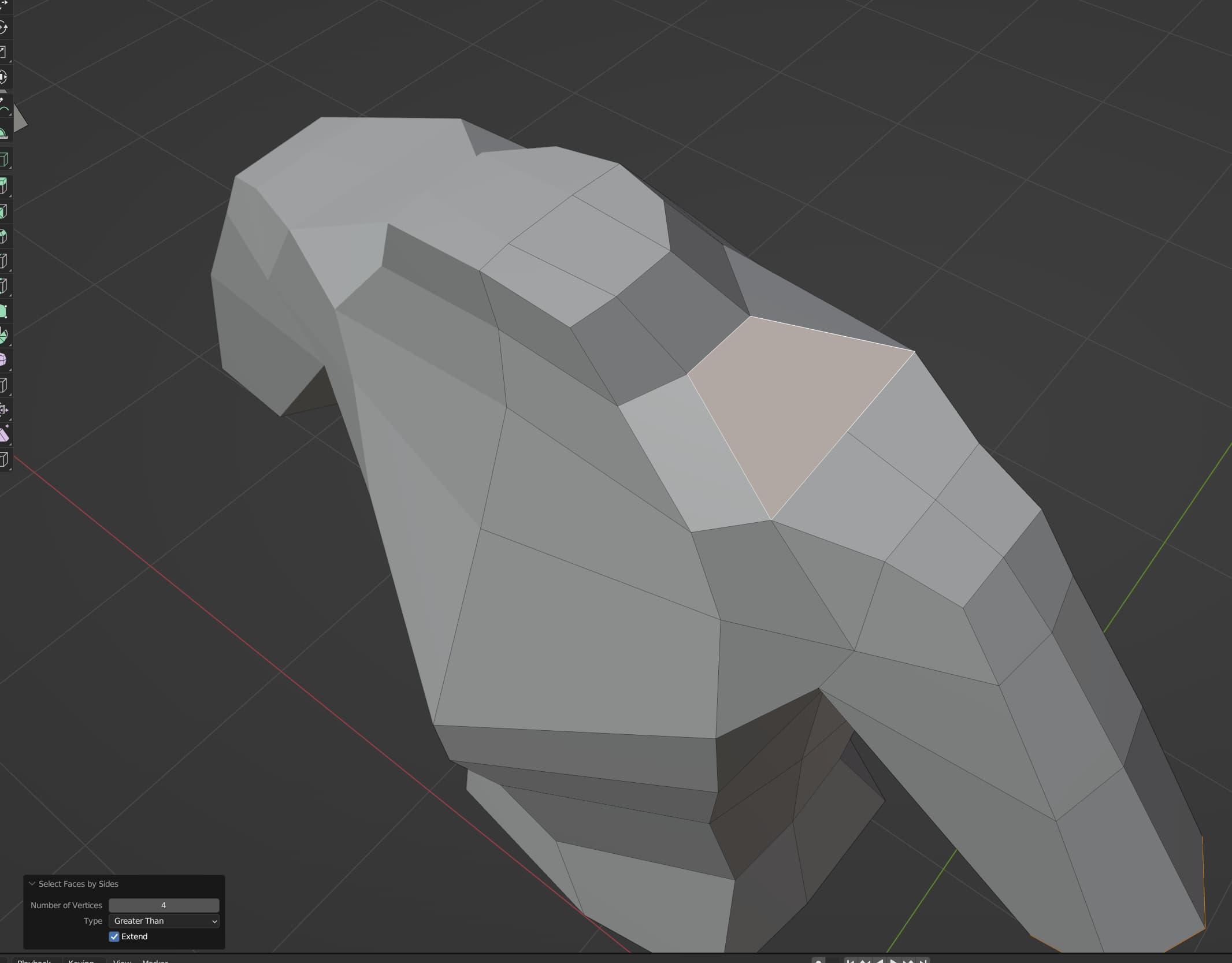 An orange shape has been highlighted, after telling Blender to select all faces with more than 4 vertices