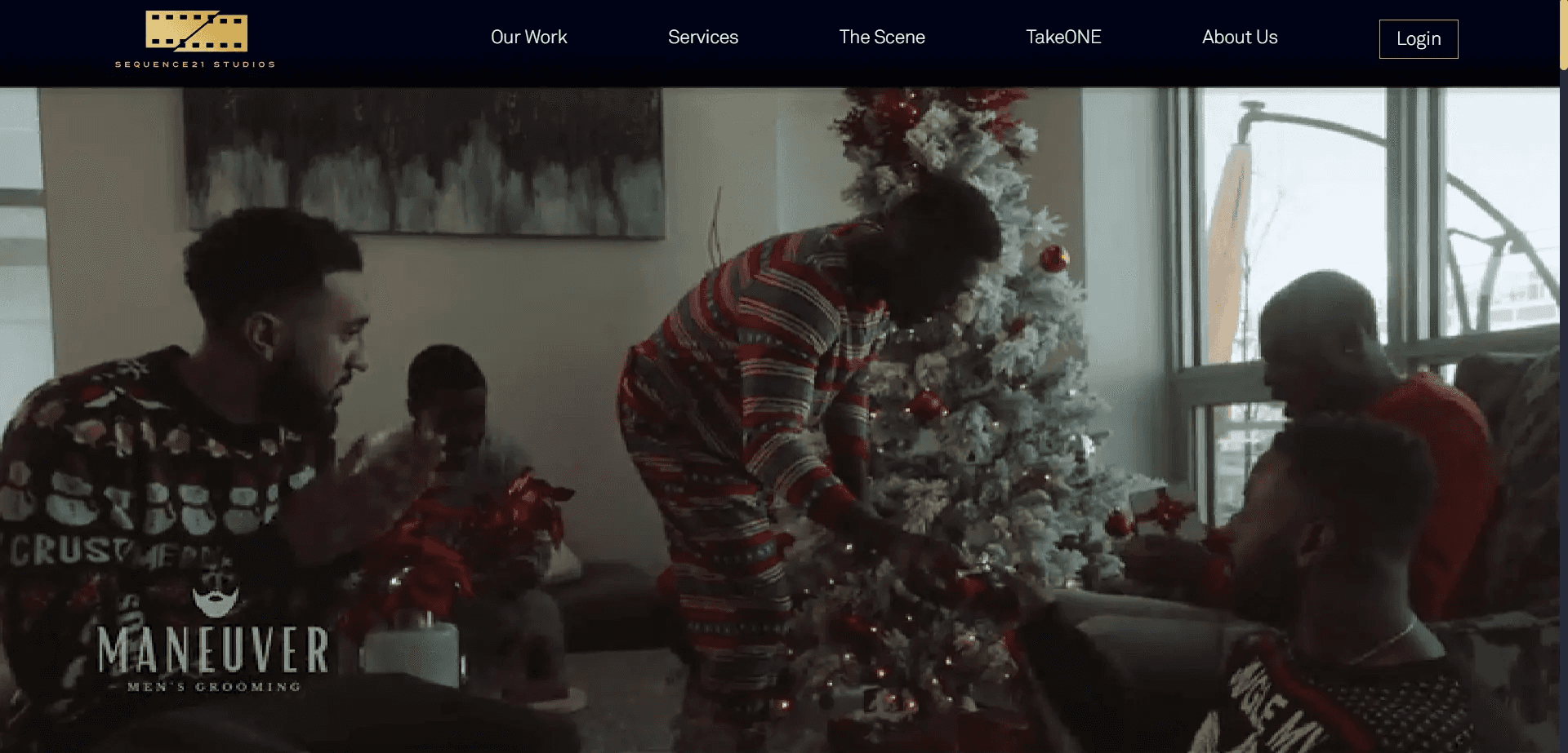 In a clip from the website's intro video, a group of men are celebrating Christmas in an advertisement produced by Sequence21